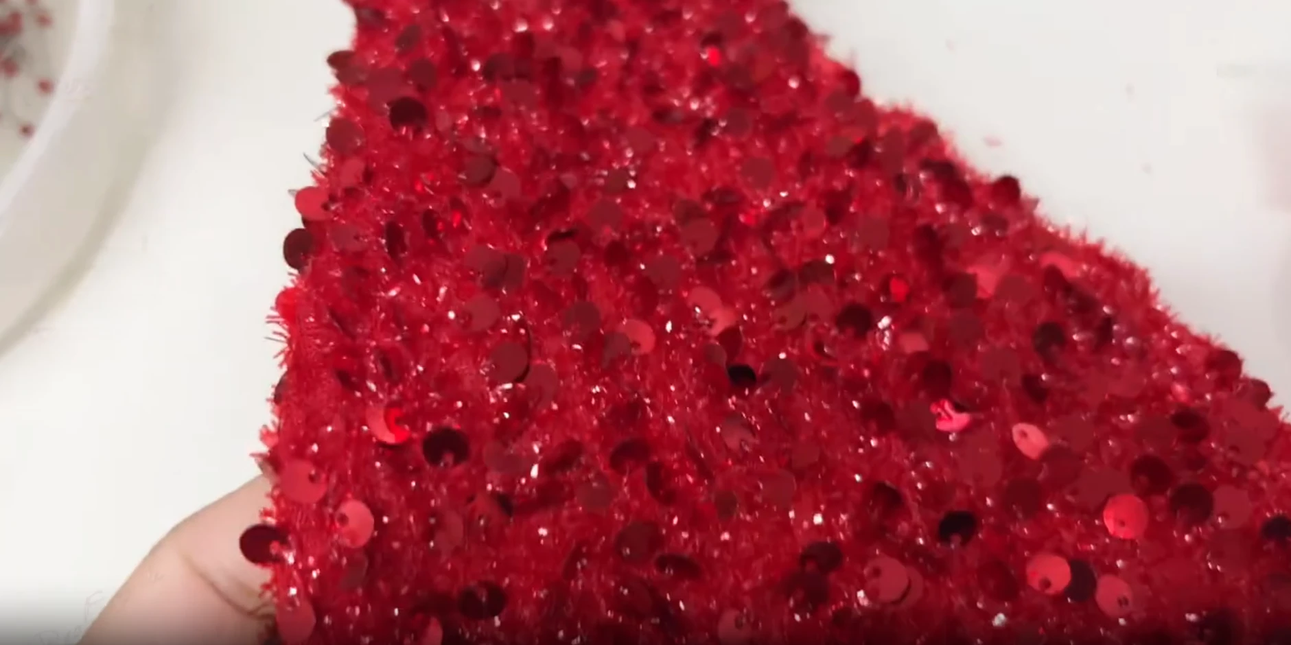 Red Sequin Fabric Texture Close up texture of red sequin fabric used for custom wedding gown