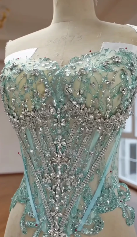 Finished crystal corset bodice of the mint green ball gown showing hand beaded details