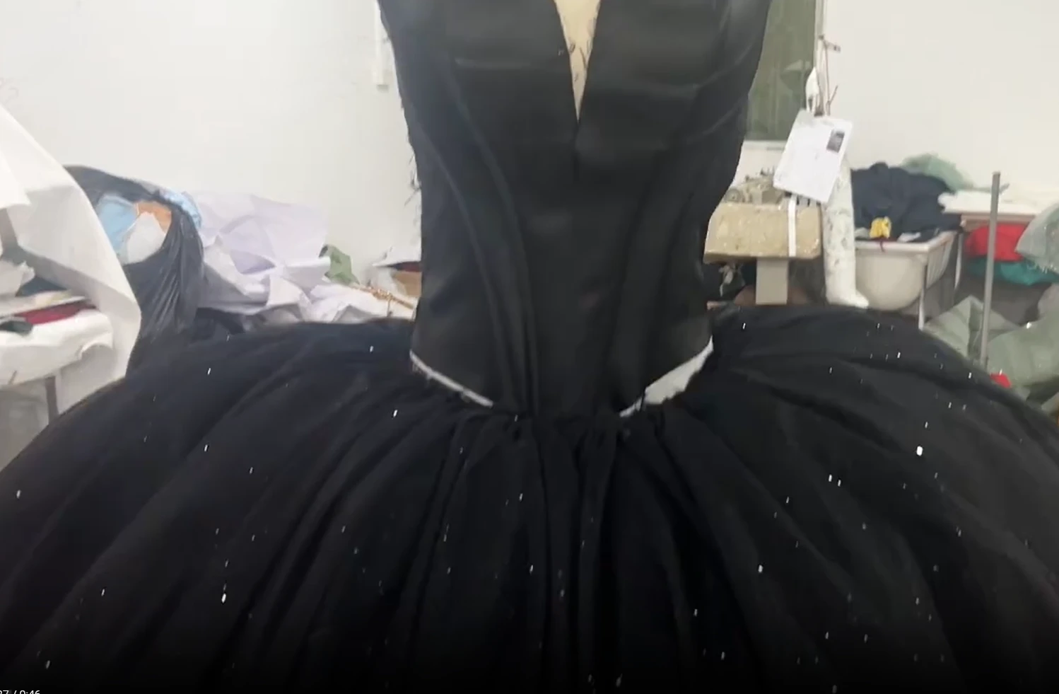 Finished strapless black ball gown with sparkling tulle