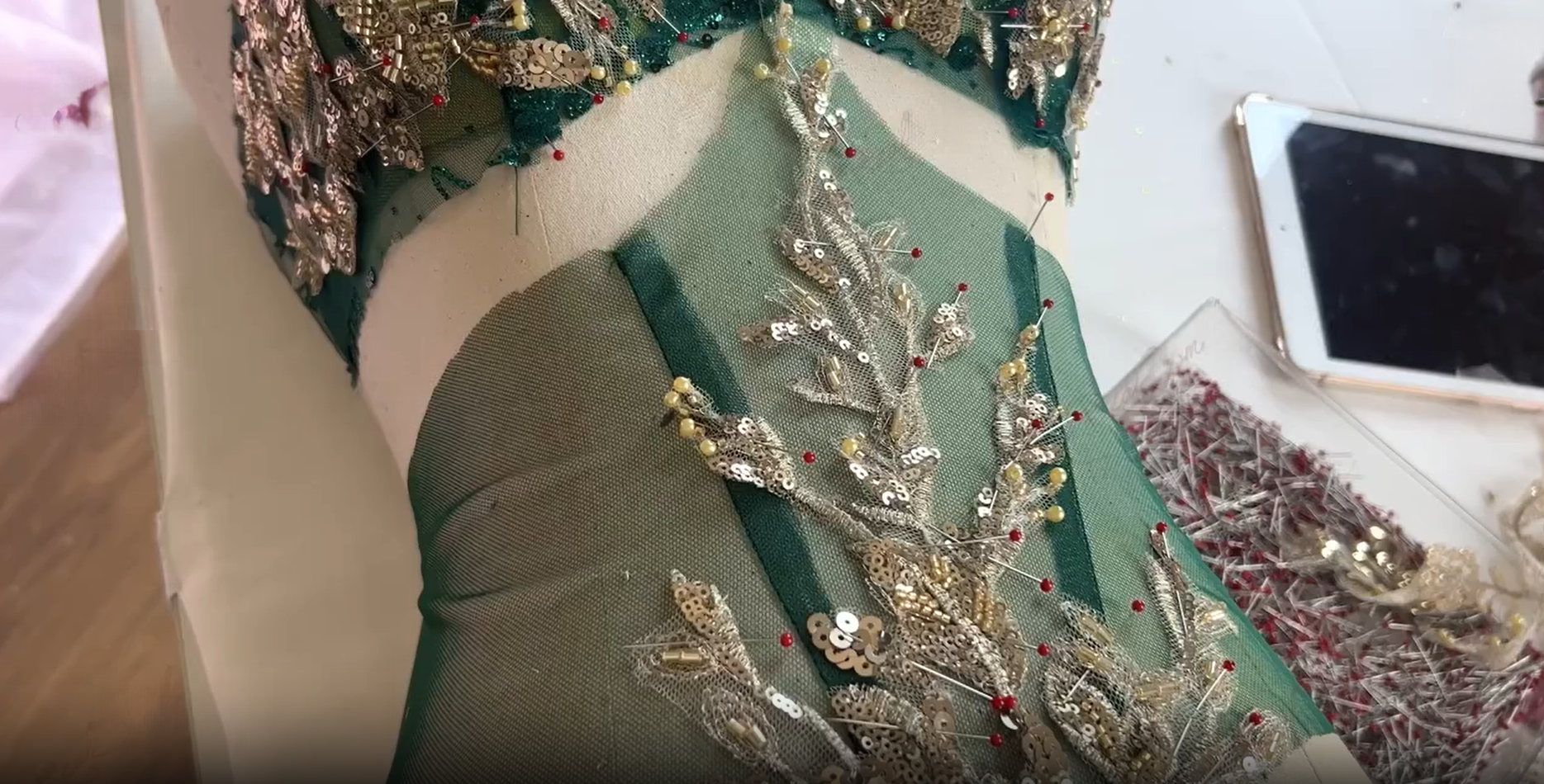 Green tulle corset bodice with gold branch detail
