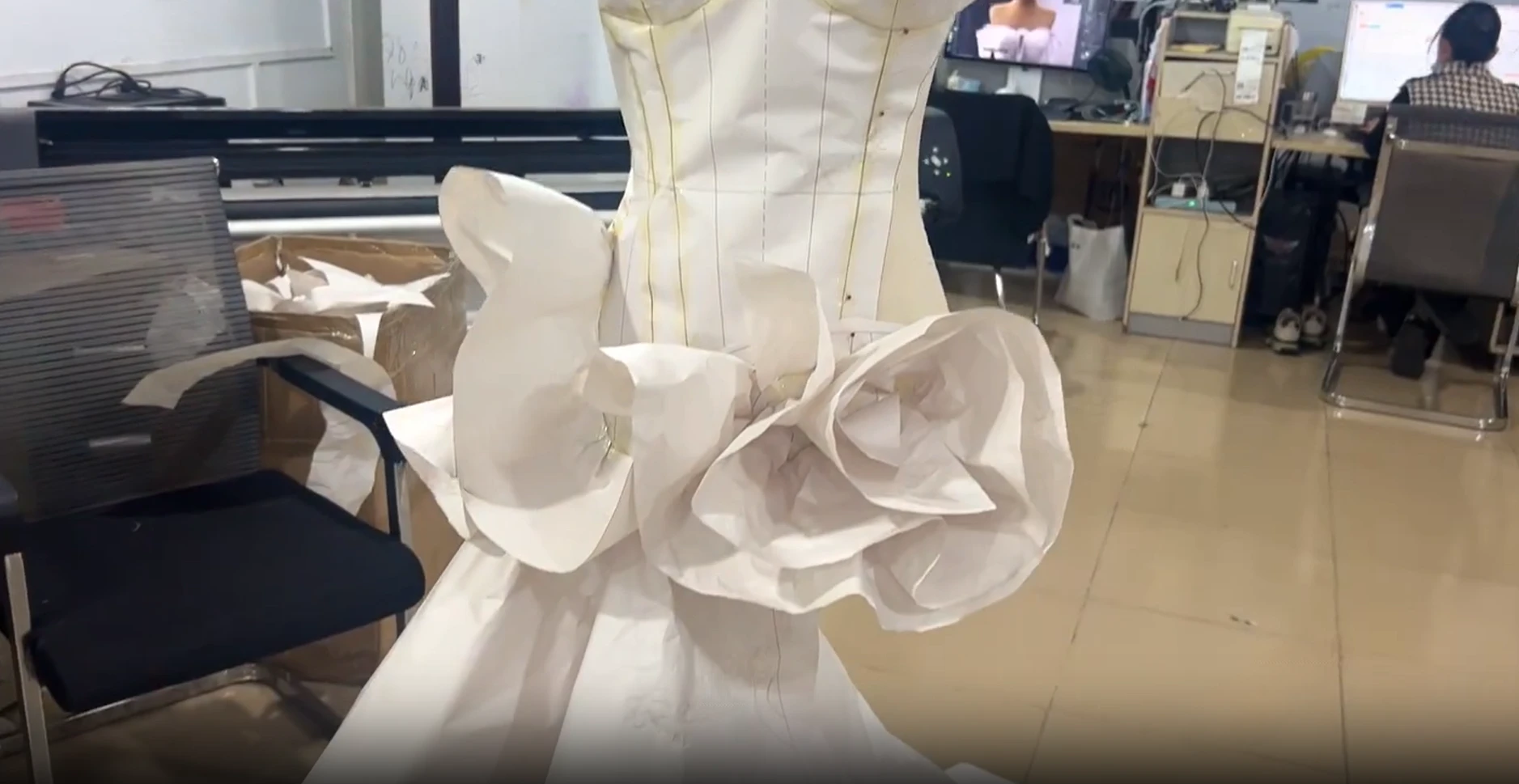 Hand crafted oversized fabric bow detail on a formal ball gown bodice
