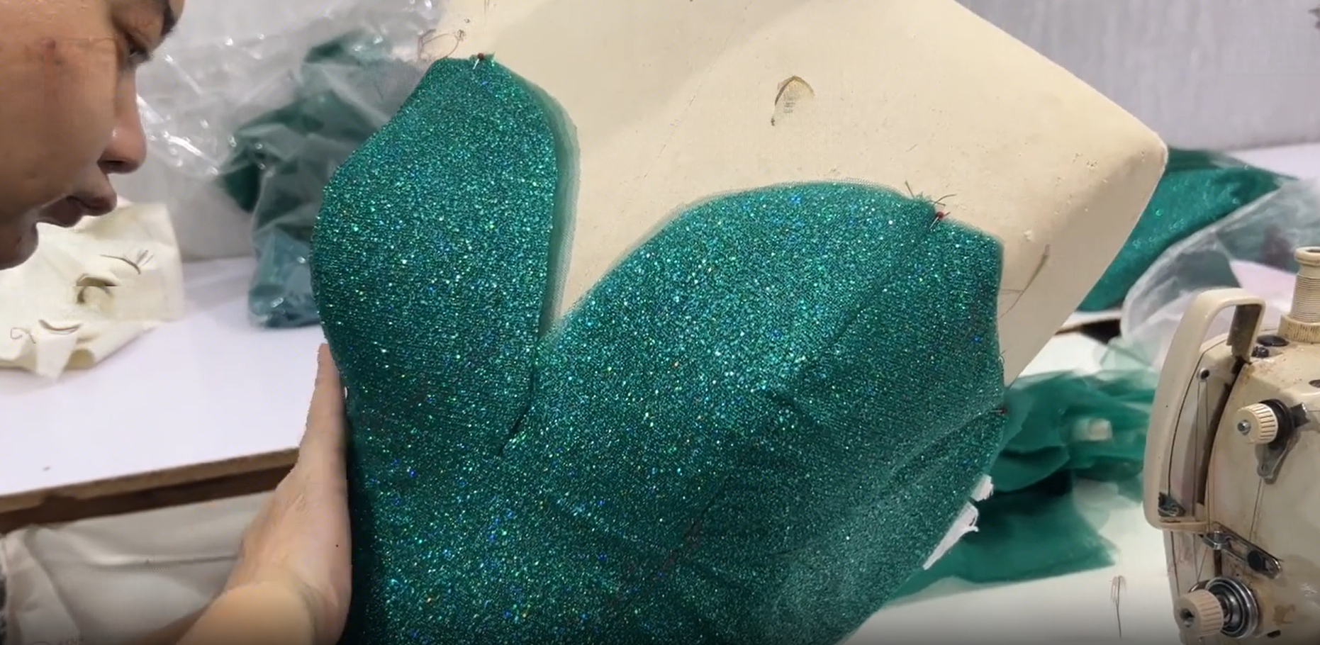 Emerald bodice fitting on professional dress form
