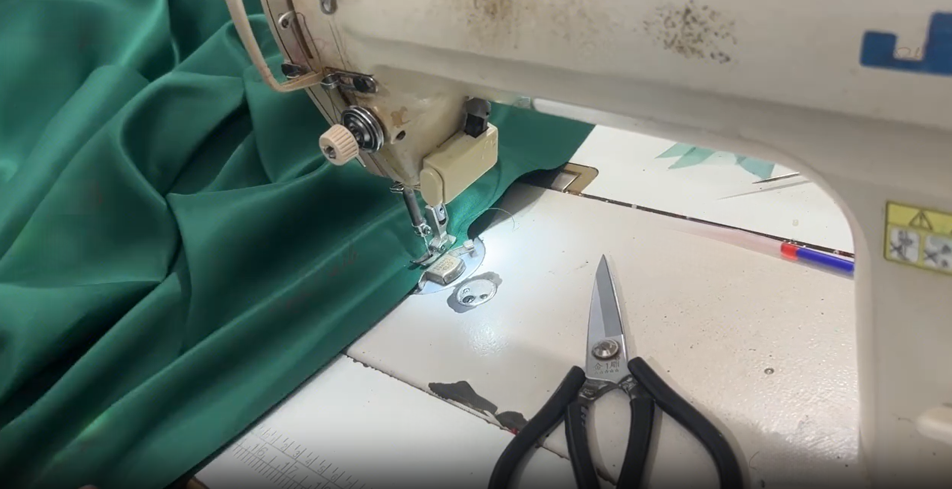 Industrial sewing machine used for ball gown construction