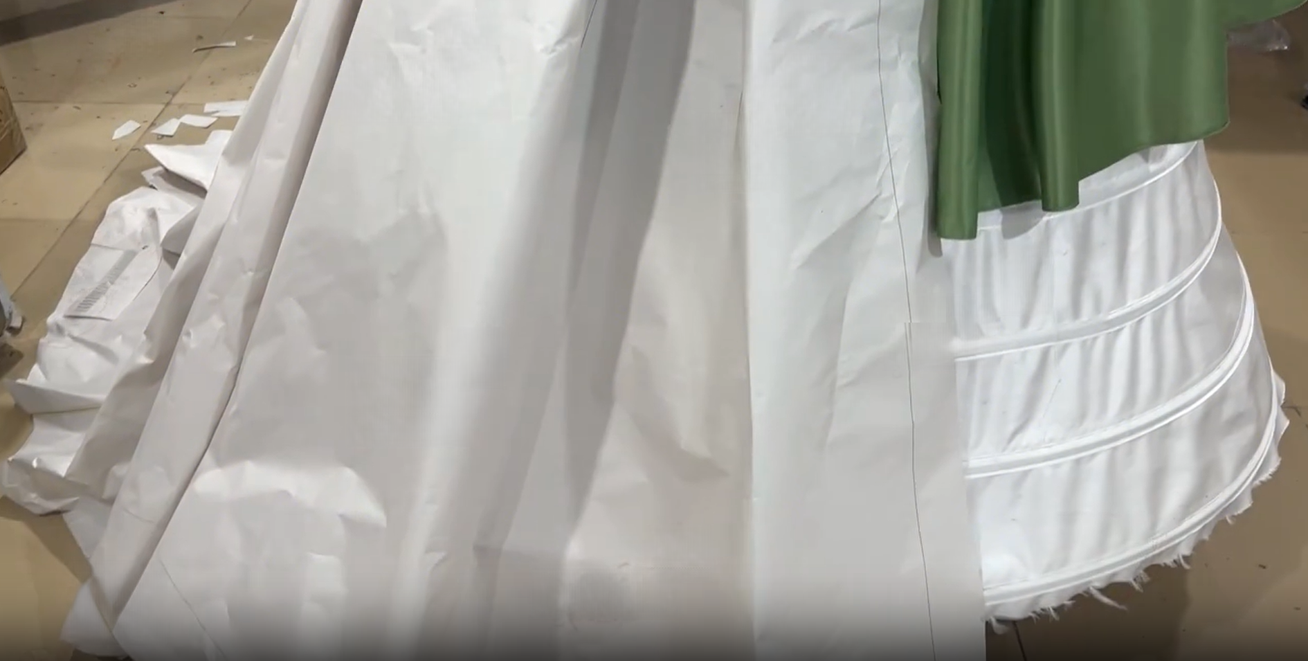 Green and white dress pattern pieces
