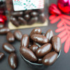 chocolat noir au coeur fondant de caramel au beurre salé, délicieuse confiserie pour les fêtes, à offrir dans son joli emballage Pécou chocolat noir au coeur fondant de caramel au beurre salé, délicieuse confiserie pour les fêtes, à offrir dans son joli emballage Pécou