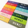 Boîtes Merci en plusieurs couleurs