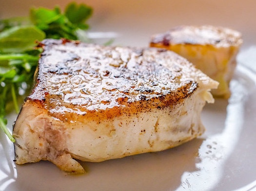 Pan-fried swordfish with lemon garlic salmoriglio sauce