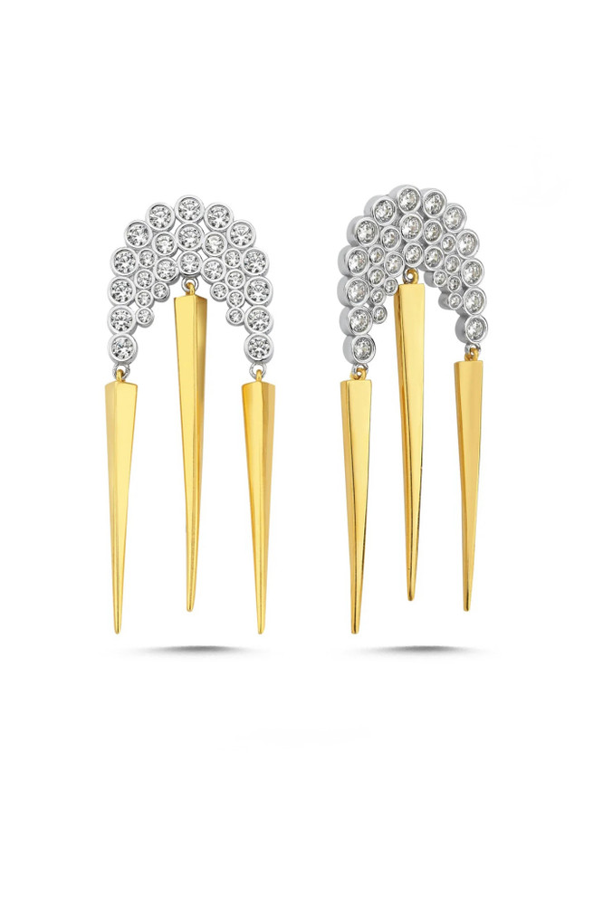 Close-up of glamorous gold-plated spike tassel earrings featuring a sparkling clear crystal cluster top and long fringe dangles