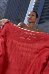 Kashesh Haadiya Coat in Ivory: Women's handwoven long jacket made from recycled fabrics, featuring 'Excellence' sequin trim and a red silk lining