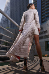 Kashesh Haadiya Coat in Ivory: Women's handwoven long jacket made from recycled fabrics, featuring 'Excellence' sequin trim and a red silk lining