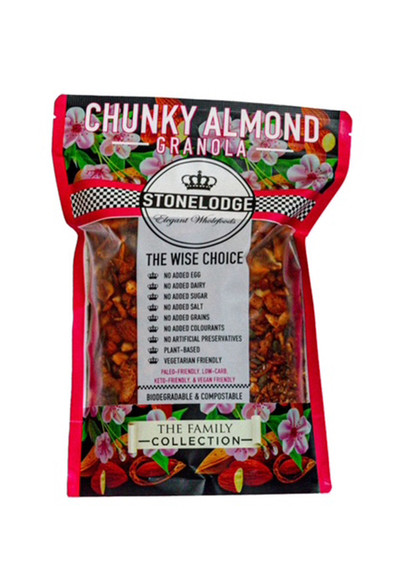 Healthy breakfast bowl featuring Stonelodge Almond Granola, fresh berries, and yogurt