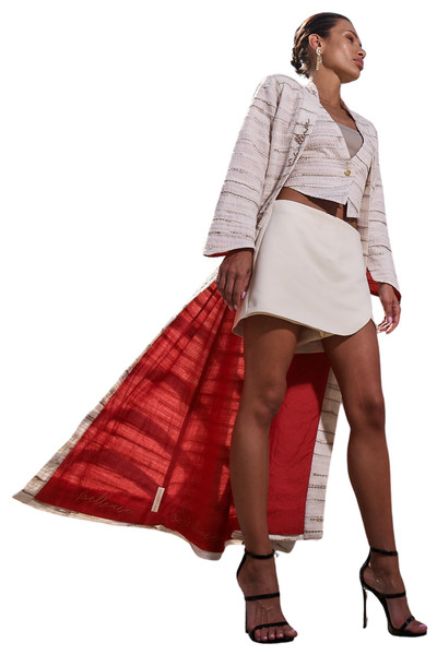Kashesh Haadiya Coat in Ivory: Women's handwoven long jacket made from recycled fabrics, featuring 'Excellence' sequin trim and a red silk lining