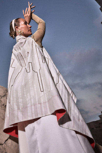 Kashesh Mahira Coat Ivory - Cream handwoven women's vest jacket featuring a glittering sequin Dubai skyline design and recycled fabric texture