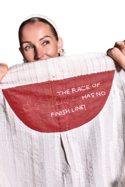 Kashesh Mahira Coat Ivory - Cream handwoven women's vest jacket featuring a glittering sequin Dubai skyline design and recycled fabric texture