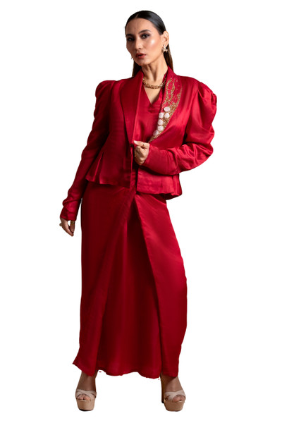 Kashesh Global Pataka Ensemble: A striking scarlet red overlap dress in a linen-satin blend, worn with a structured puff-sleeve statement jacket featuring genuine rose quartz hand-embroidery