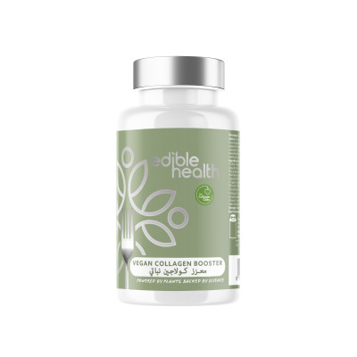 White bottle of Vegan Collagen Booster capsules containing Vollagen amino acids and Mesoporosil Silica. Label highlights Vitamin C and E content for skin, hair, and joint support. Vegan Society approved logo visible.