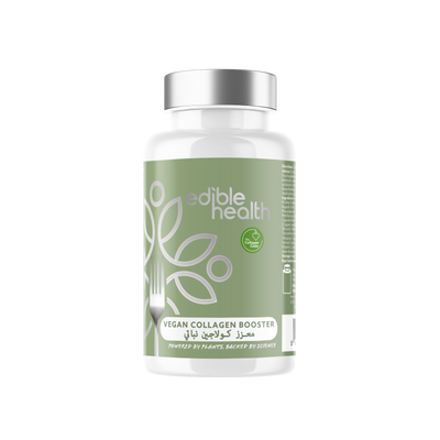 White bottle of Vegan Collagen Booster capsules containing Vollagen amino acids and Mesoporosil Silica. Label highlights Vitamin C and E content for skin, hair, and joint support. Vegan Society approved logo visible.