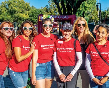 Smiling Pet Food Express employees at Bay Area Pet Fair