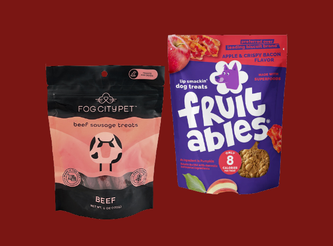 Dog eating treats form a bowl