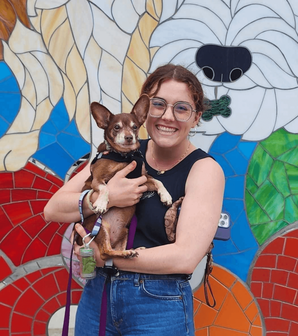 Woman holding Chihuahua