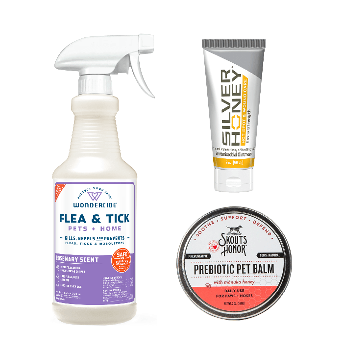 A fle and tick protection spray, a container of prebiotic balm, and a tube of Silver Honey wound care ointment