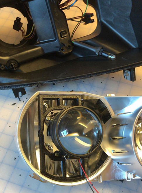 Pre-LCI (06-08) Xenon Projector Bracket for Halogen Headlights for BMW vehicles Pre-LCI (06-08) Xenon Projector Bracket for Halogen Headlights for BMW vehicles