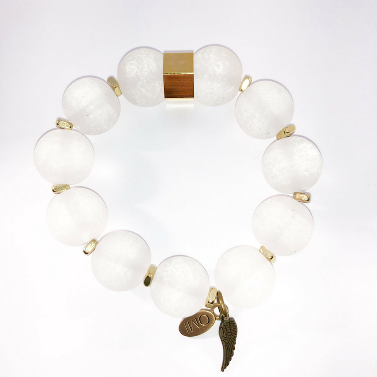 clear sea glass with gold square spacers and geometric bead