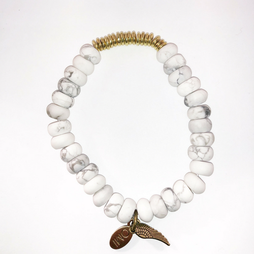 White Marble Howlite Rondelle with gold discs 8MM White Marble Howlite Rondelle with gold discs 8MM