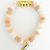 Just Peachy matte agate rondelle with gold hammered tube 8MM Just Peachy matte agate rondelle with gold hammered tube 8MM