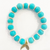 Sea la Vie Turquoise agate with shell and gold spacers 10MM Sea la Vie Turquoise agate with shell and gold spacers 10MM