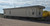 57x12 Manufactured Home/ Mobile Office For Sale on trailer/axles