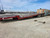 Vulcan Heavy-Duty Tri-Axle Oilfield Float Trailer – Fixed Gooseneck – 8' Wide – Approx. 34' Deck