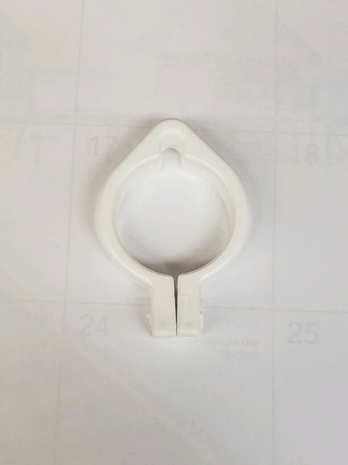 White plastic clamp ring with mounting hole, used for securing pool accessories or vertical tubing White plastic clamp ring with mounting hole, used for securing pool accessories or vertical tubing