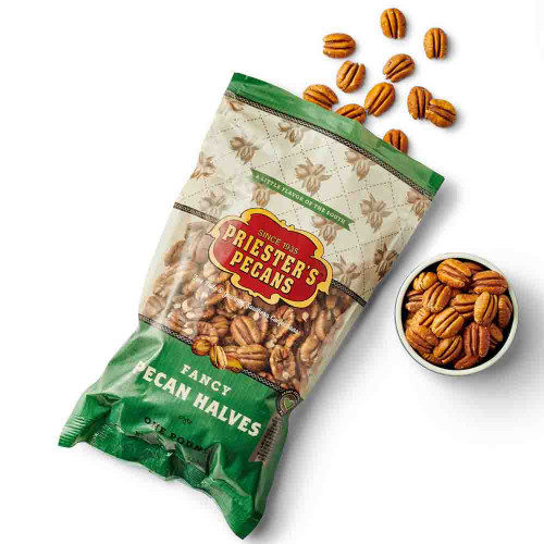  Priester’s Junior Mammoth Natural Pecan Halves in a 1 lb. bag with a small bowl of pecans and scattered pecan halves.