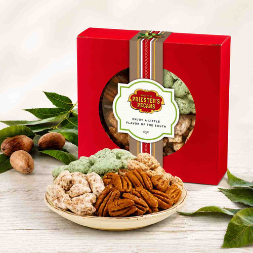 Pecan Delight Gift Box featuring roasted salted, praline, frosted, and key lime pecans in a signature red gift box by Priester's Pecans.