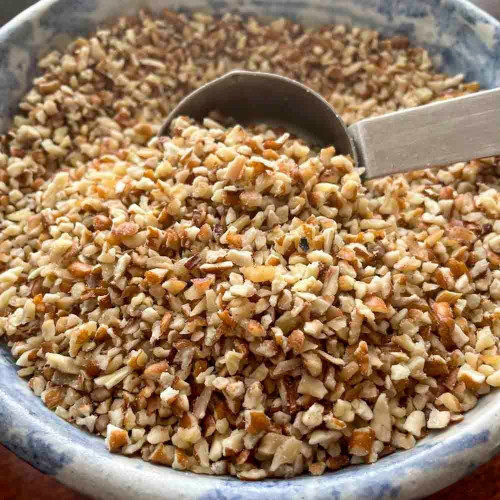 Closeup of extra small pecan pieces
