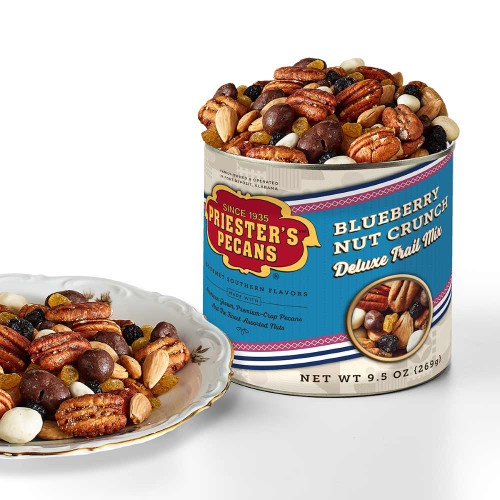 Priester’s Blueberry Nut Crunch Deluxe Trail Mix 9.5 oz canister with pecans, nuts, blueberries, and snack mix served on a plate