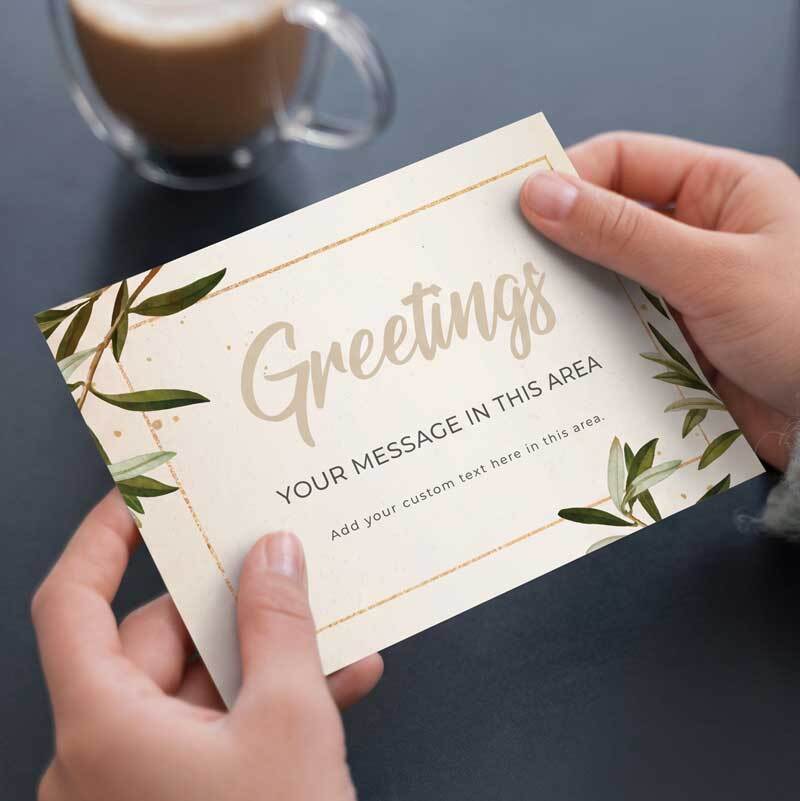 Hands holding a custom enclosure card with a personalized greeting message