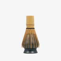 Bamboo whisk on whisk holder from the Matcha Tool Kit from The Jasmine Pearl Tea Co.
