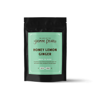 2 oz. packaging for Honey Lemon Ginger loose leaf green tea from The Jasmine Pearl Tea Co.