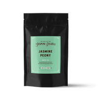 2 oz. packaging for Jasmine Peony loose leaf green tea from The Jasmine Pearl Tea Co.