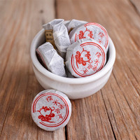 Sticky Rice Mini Tuocha loose leaf puerh tea from The Jasmine Pearl Tea Co. Sticky Rice Mini Tuocha loose leaf puerh tea from The Jasmine Pearl Tea Co.