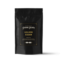 2 oz. packaging for Golden Assam loose leaf black tea from The Jasmine Pearl Tea Co.