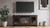 Camiburg - Warm Brown - 60" TV Stand With Faux Firebrick Fireplace Insert