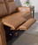 Tryanny - Butterscotch - Power Reclining Loveseat/ Adj Headrest