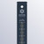 A black snow ruler with white text and gold graduations to the tenth of an inch.