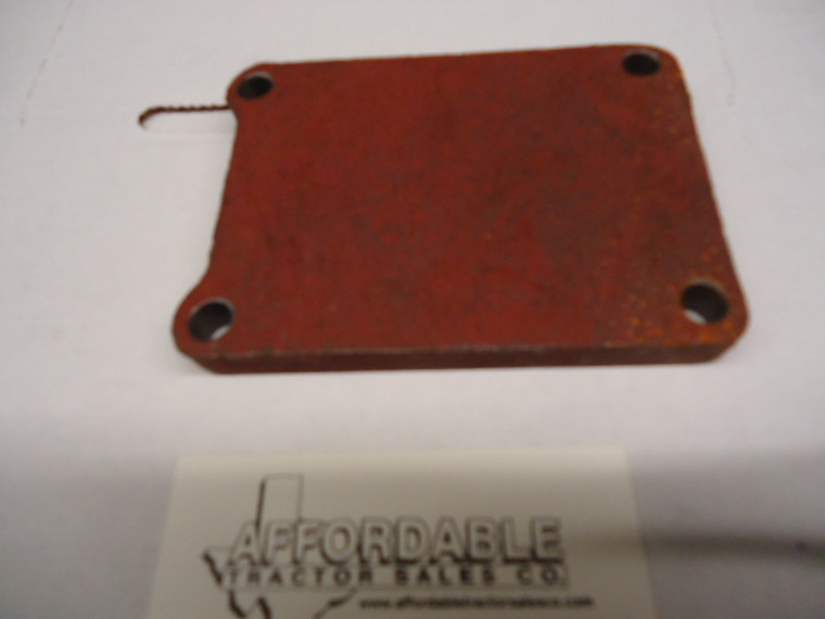 Backhoe pump cover plate