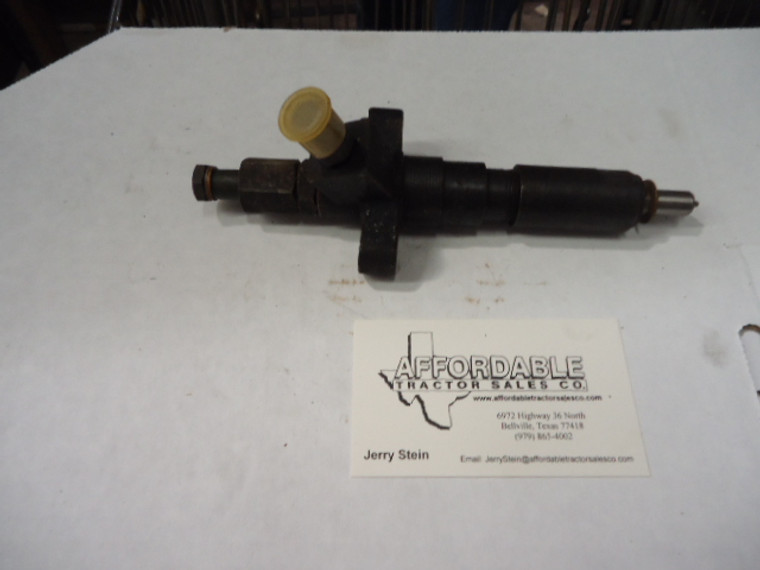 Fuel injector ty290 long style 4.75in from bottom of hold down to nozzle tip(note 1 of 2 types available)