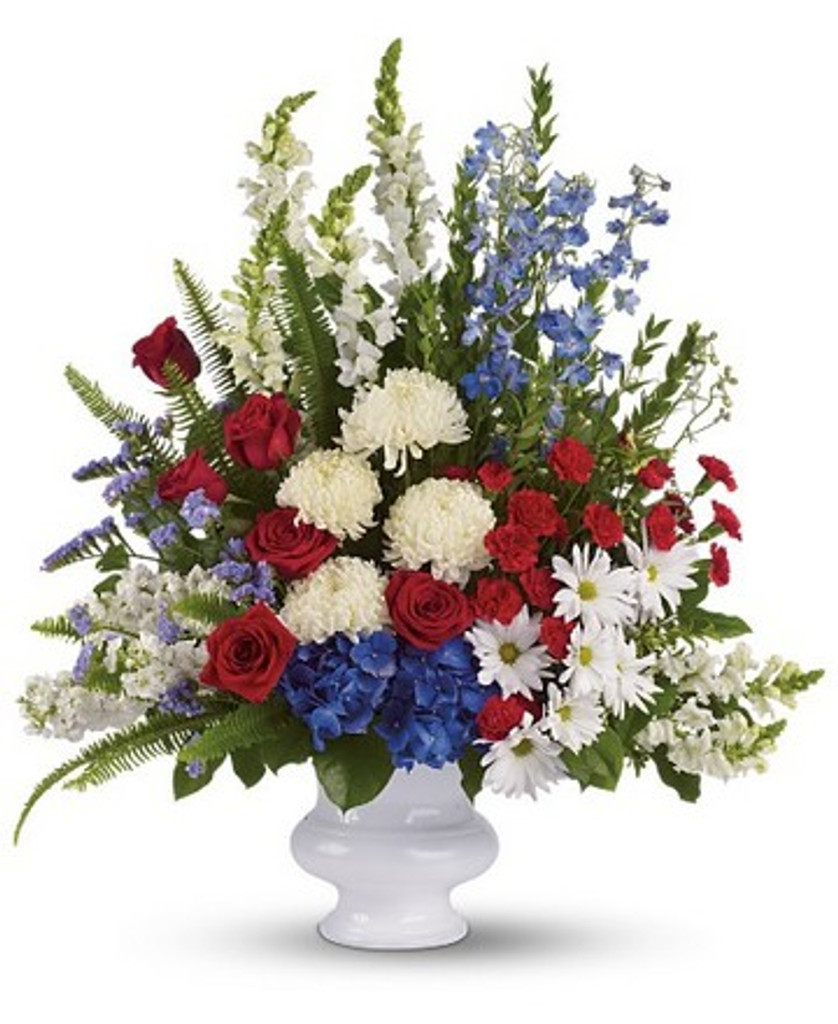 Funeral pedestal arrangement with seasonal flowers available for local delivery in Gilbertsville, PA