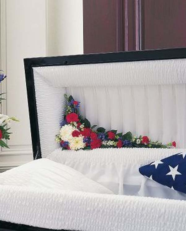 Custom funeral casket accent flowers with roses and white blooms for memorial services in Gilbertsville, PA
